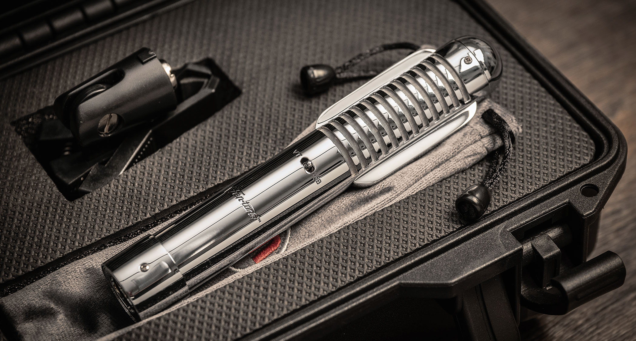 Warm Audio Fen-Tone WA-FT ribbon microphone photographed in its hard case with accessories.