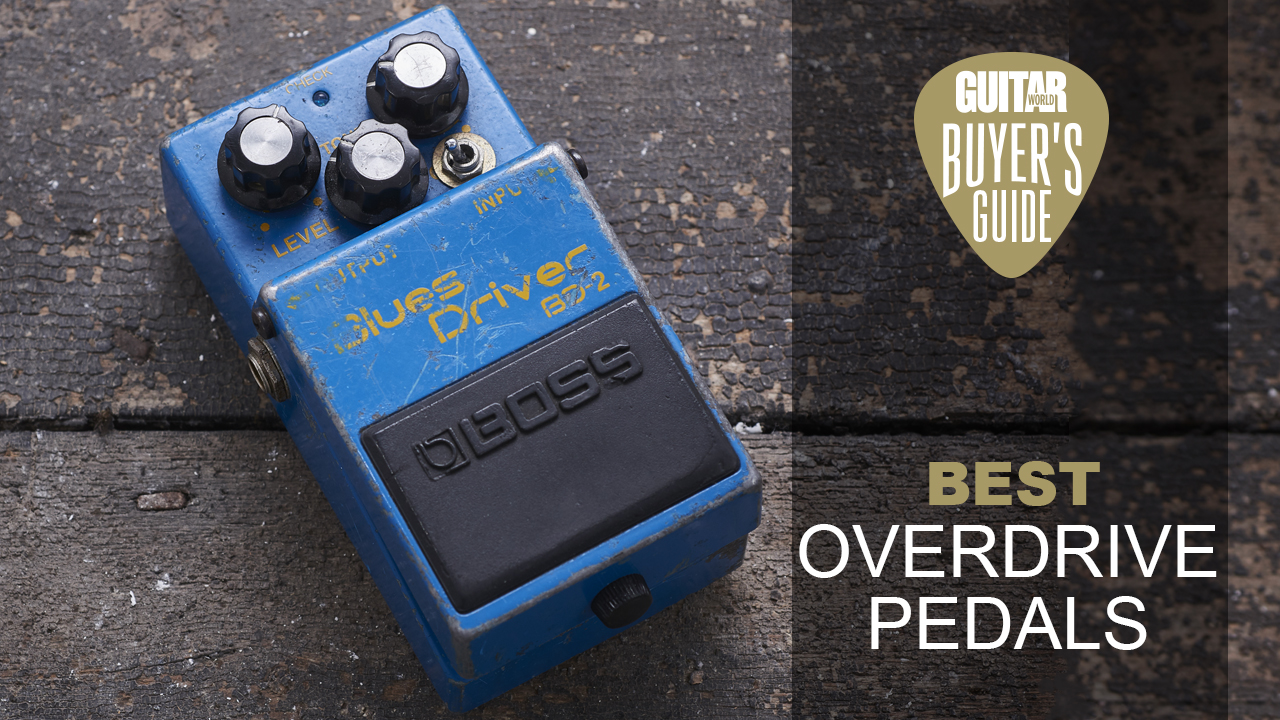 A heavily worn Boss BD-2 Blues Driver overdrive pedal on a wooden floor