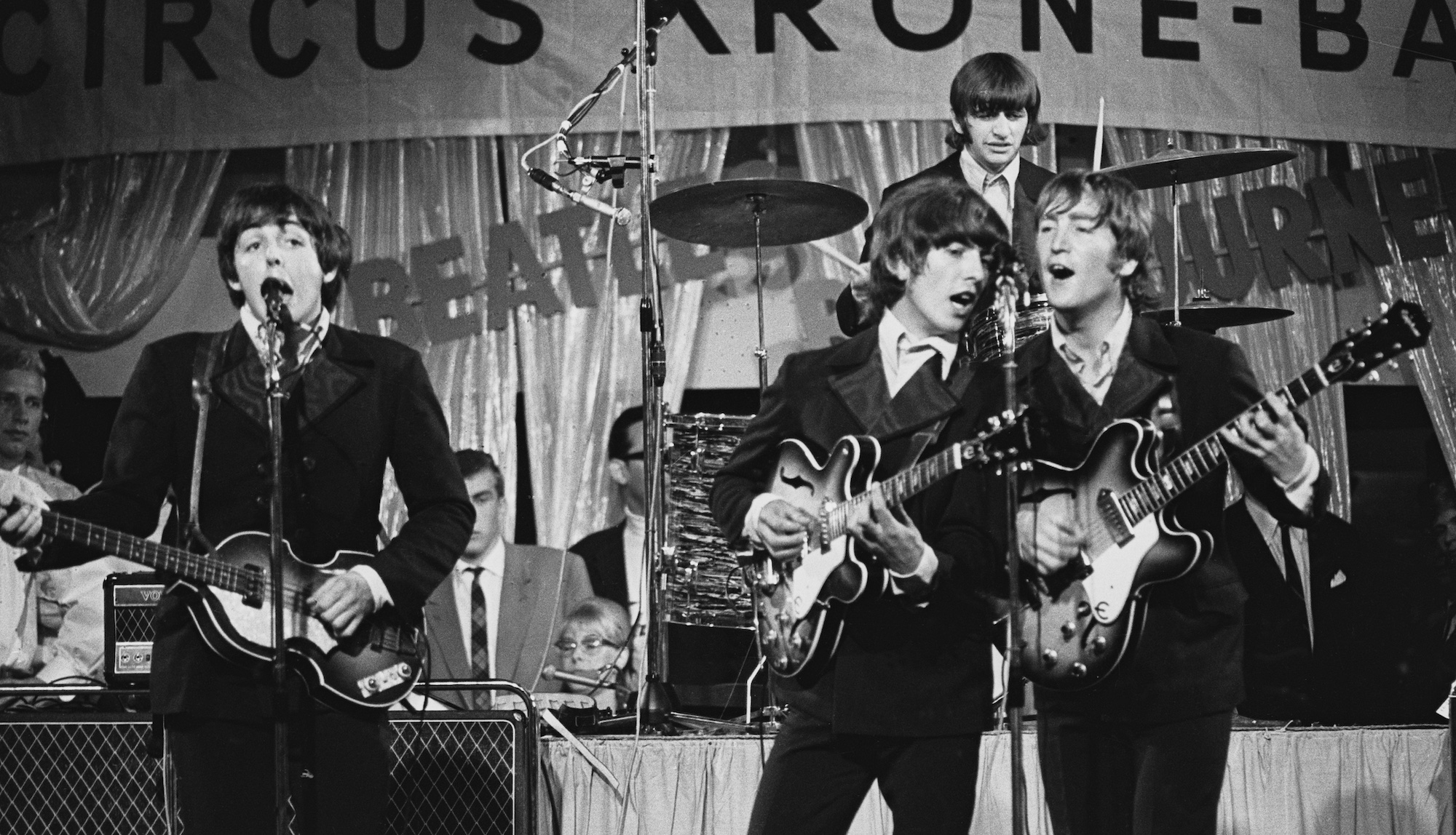The Beatles perform onstage at the Circus Krone-Bau in Munich, Germany on June 24, 1966